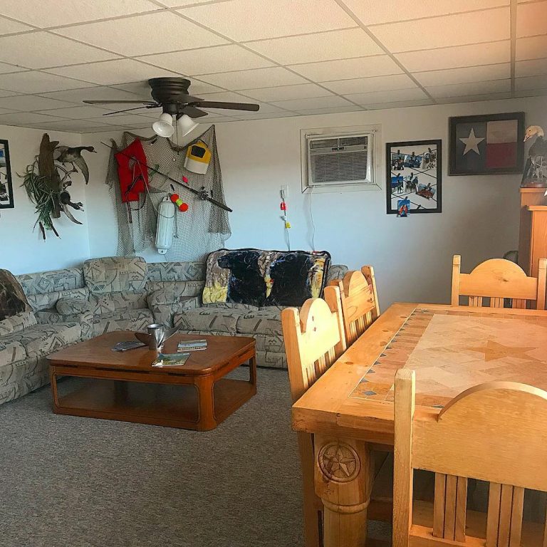 Freeport TX Fishing Charters Lodge - table and couch